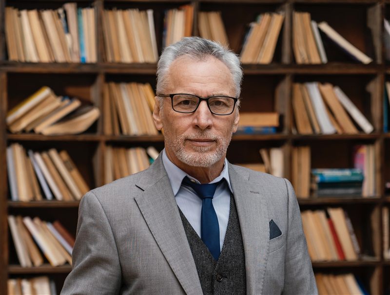 Portrait of John Appleseed, Senior Partner